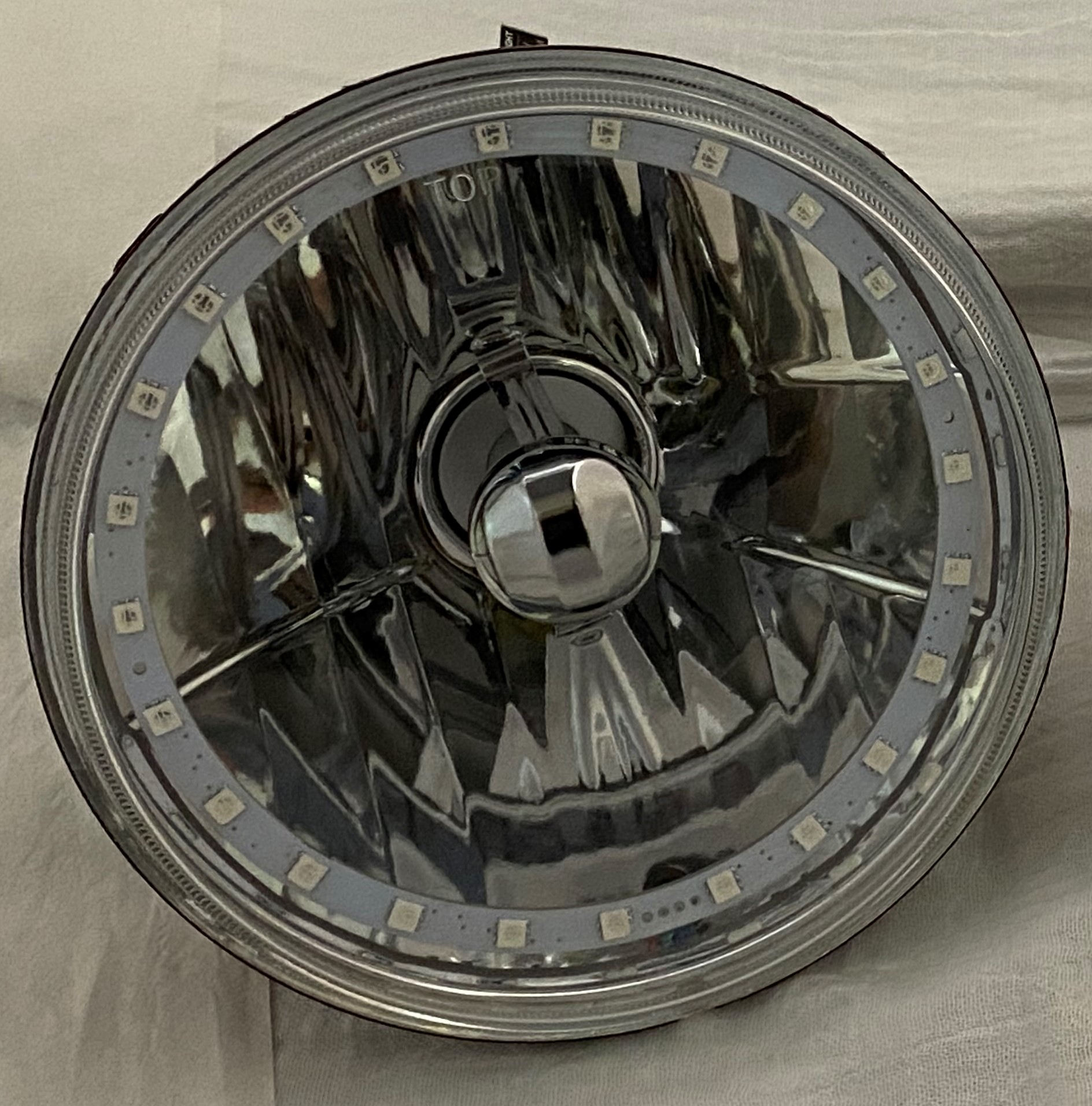 One Each of 7 Inch Round Elite Diamond MultiColor Halo Headlight with