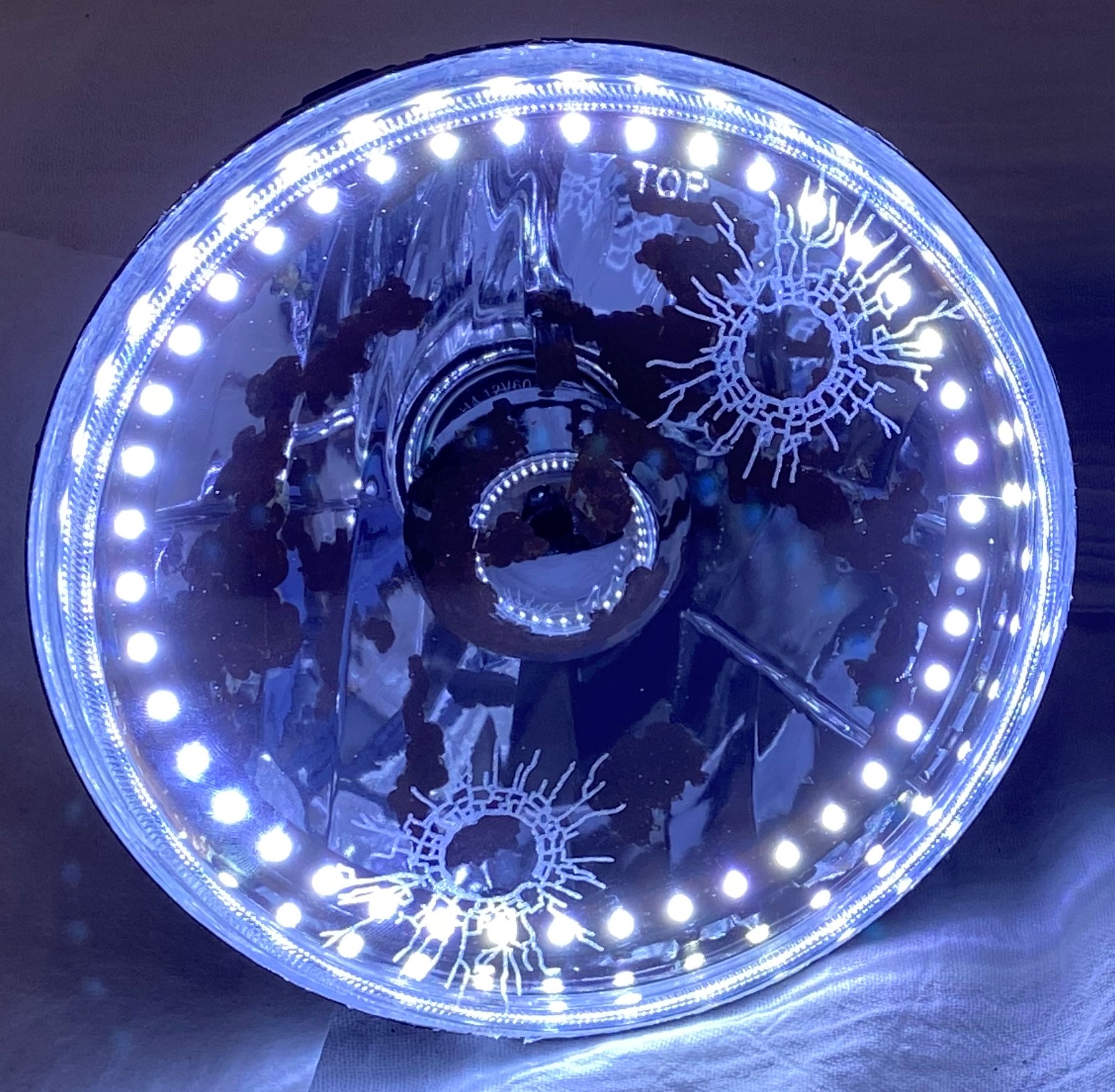 One Each of 7 Inch Round Elite Diamond Single Color White Halo Rat Rod Headlight with a Clear Halogen Bulb