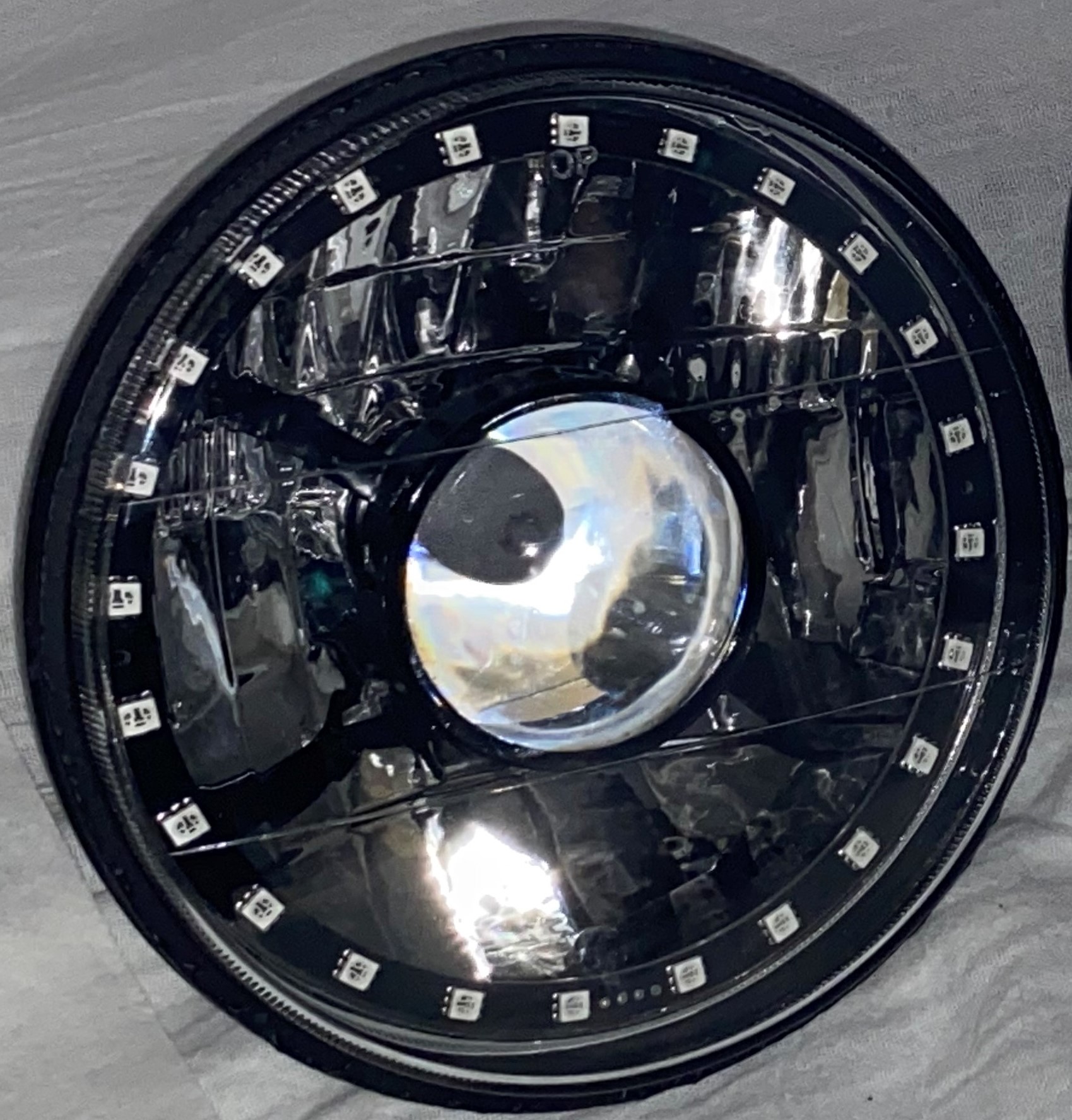 One Each of 7 Inch Round White Diamond Projector Multi-Color Halo Black Illusion ™ Headlight with a Clear Halogen Bulb - Image 8