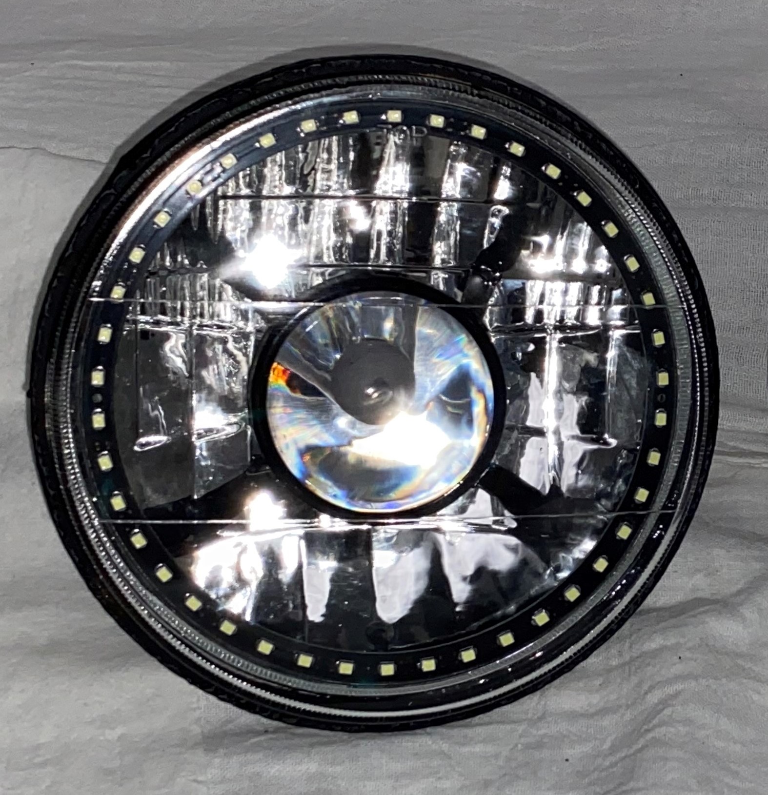 One Each of 7 Inch Round White Diamond Projector Single Color White Halo Black Illusion ™ Headlight with a Clear Halogen Bulb - Image 6