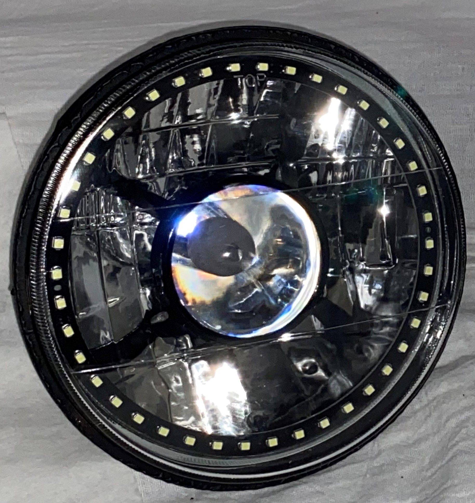 One Each of 7 Inch Round White Diamond Projector Single Color White Halo Black Illusion ™ Headlight with a Clear Halogen Bulb - Image 11
