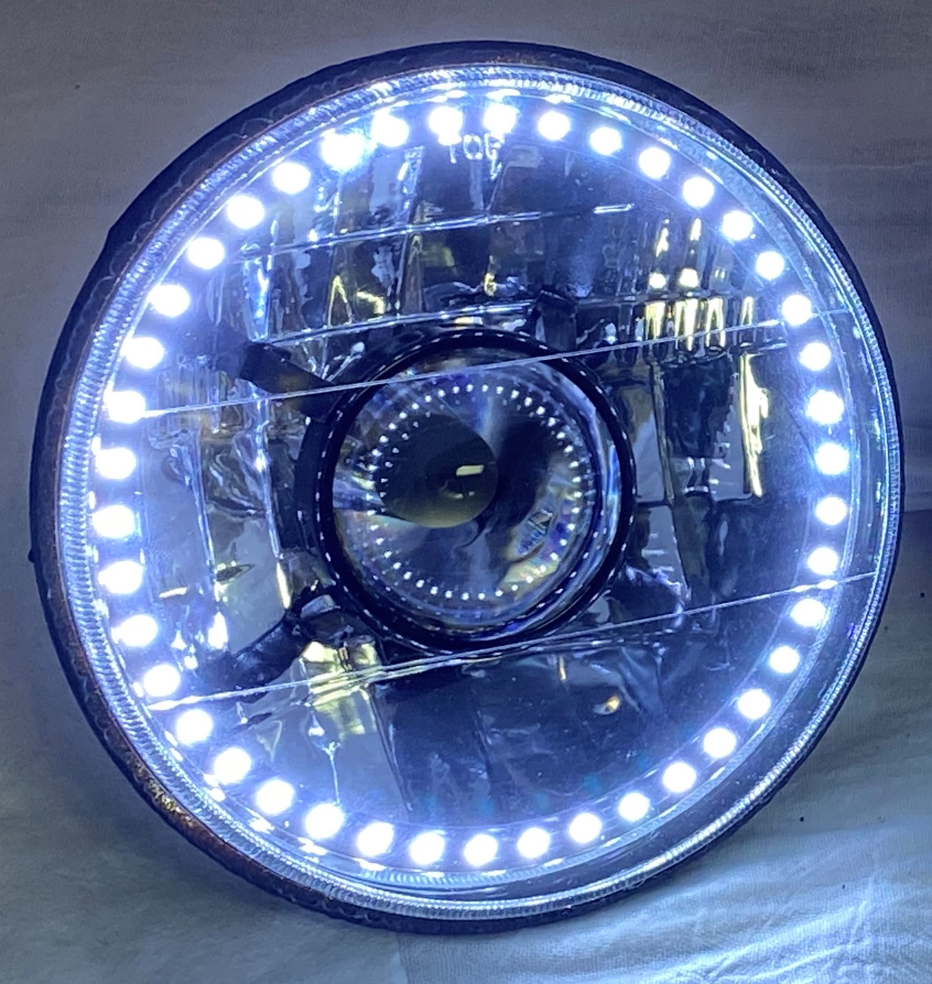 One Each of 7 Inch Round White Diamond Projector Single Color White Halo Black Illusion ™ Headlight with a Clear Halogen Bulb - Image 15