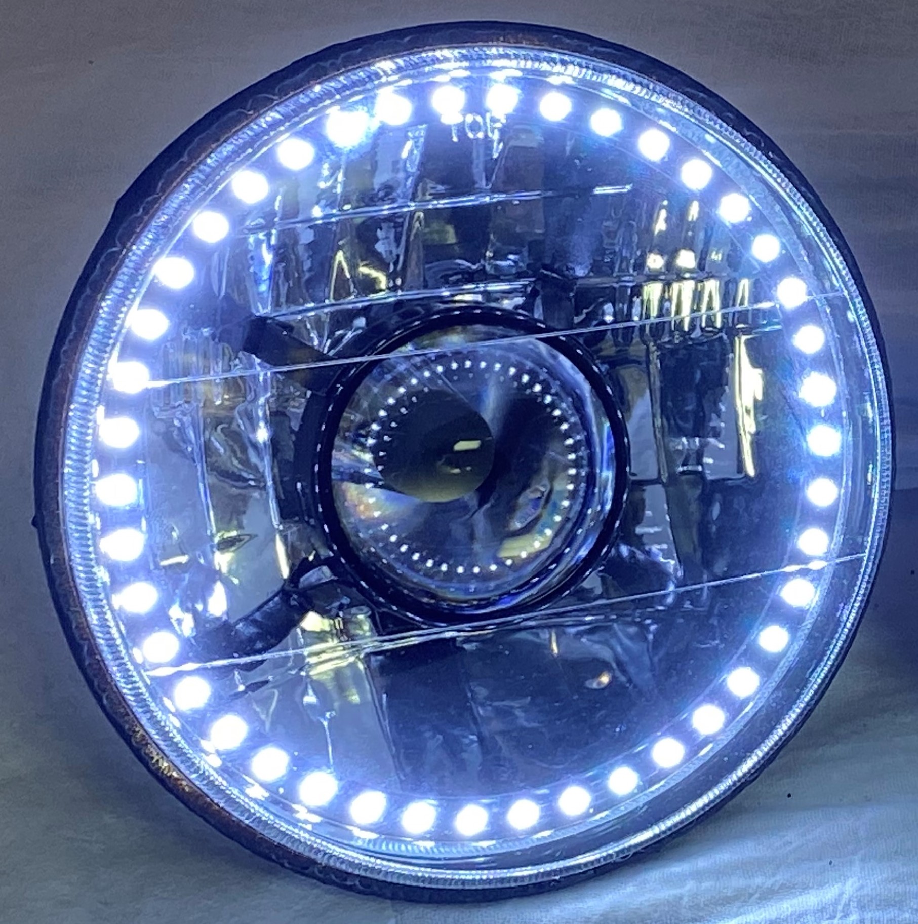 One Each of 7 Inch Round White Diamond Projector Single Color White Halo Black Illusion ™ Headlight with a Clear Halogen Bulb - Image 16